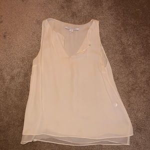 DVF white sleeveless blouse